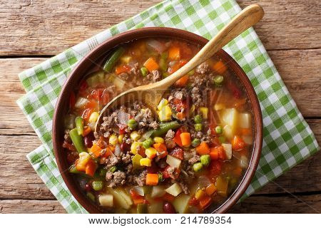 Hamburger Soup With Ground Beef And Vegetables Close-up In A Bowl. Horizontal Top View