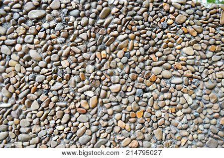 many multicolored small beautiful pebbles background backdrop