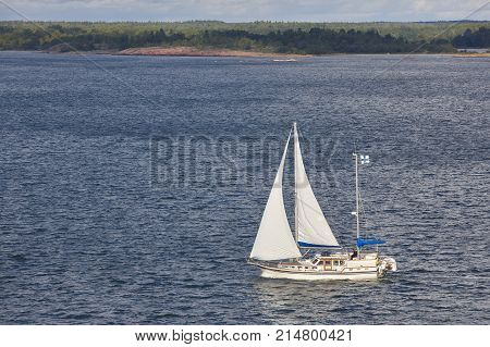 Sailing in Finland coastline. Aland archipelago. Finnish summer sport. Outdoor