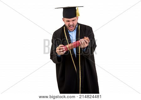 Male student in graduation gown gesturing with hands isolated on white background.