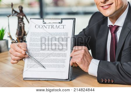 Lawyer Pointing At Contract