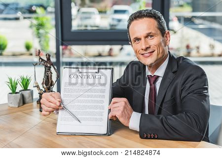 Lawyer Pointing At Contract