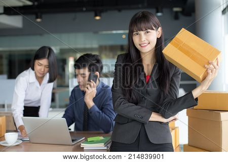 Young Asian Woman Holding Box With Smiling Together, Young Owner Woman Start Up For Business Online,