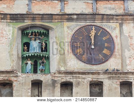 The decorated Clock from the Clock Tower served as the main gate to the city's citadel in Sighisoara city in Romania