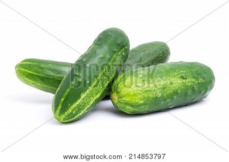 Fresh green cucumbers isolated on white background