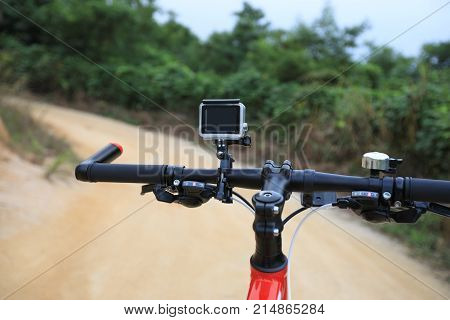 closeup of action camera mounted on mountain bike