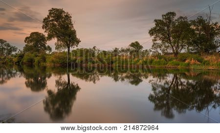 Warm Sunset Over Warta River In Warta Landscape Park, Poland.