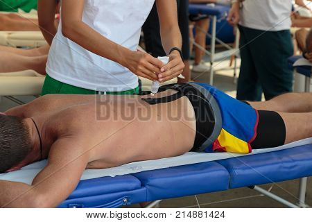 Ahlete's Back Massage After Fitness Activity: Wellness And Sport