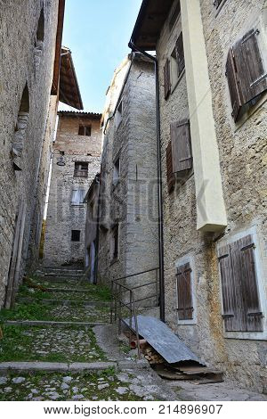A small street in the hill village of Erto in Friuli Venezia Giulia north east Italy. The village is famous locally for having being evacuated following the 1963 Vajont Dam disaster.