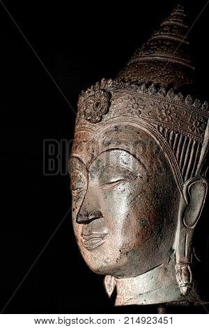 Buddha head High contrast close up of traditional buddhist statue. Zen buddhism image.