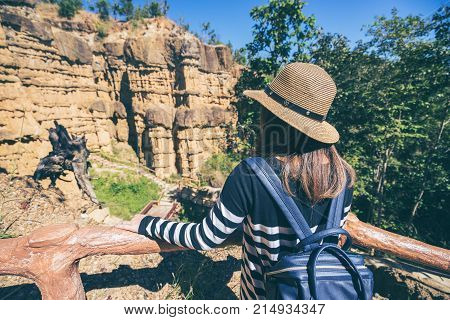 Young Asian Woman Traveler Travelling To Wonderful Soil Cliff Pha Cho At Mae Wang National Park, Doi