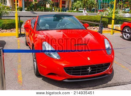 Las Vegas, United States of America - May 05, 2016: Luxurious and Colorful Cars for Rent Waiting in the Parking Lot of a Supermarket on the Las Vagas Strip, Nevada on May 05, 2016