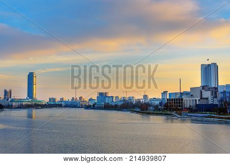 View of Iset river embankment on sunset. Yekaterinburg. The Urals. Russia