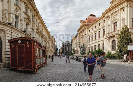 Bucharest, Romania - September 9, 2017: Panoramic view of walking tourists on the street of the historical center Lipscani Street - the Bucharest's liveliest entertainment district