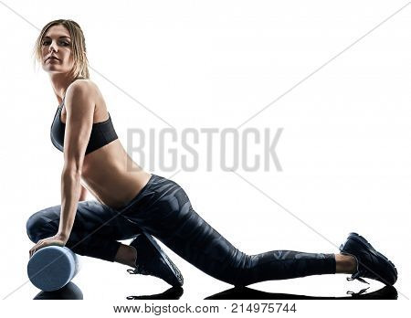 one caucasian woman exercising pilates fitness foam roller exercises isolated  silhouette on white background