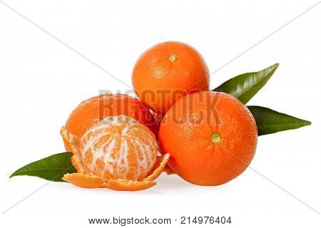 Orange Mandarines, Clementines, Tangerines or small oranges with one peeled with leaves isolated on white background, cut out or cutout
