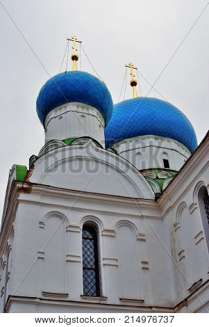 Monastery of the Epiphany in Uglich, Russia. Women's monastery. New Epiphany cathedral. Blue sky with clouds background.