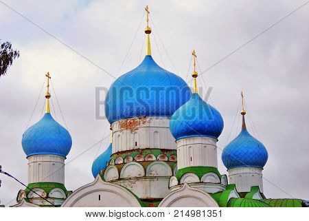 Monastery of the Epiphany in Uglich, Russia. Women's monastery. New Epiphany cathedral. Blue sky with clouds background.