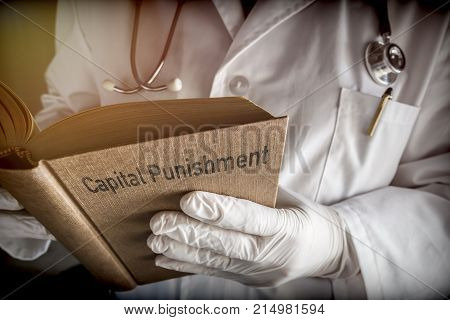 Doctor Reading Book of capital punishment In A Hospital, Conceptual Image
