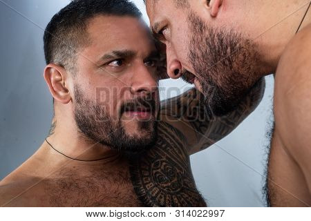 Face Bearded Hipster Man Reflecting In Mirror. Guy Sorry About Past. Sad And Sorrow. Painful Past Ti