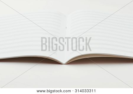 Blank Book For Musical Notes. Blank Musical Notes Sheets. Music Copy Book. Blank Sheet Music Page.