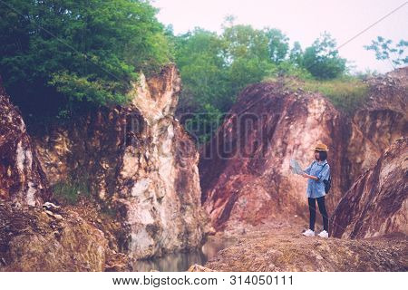 Solo Travel In Local Asia, Teenager Traveler Holding Map While Hiking On Mountain, Solo Tourist Trav