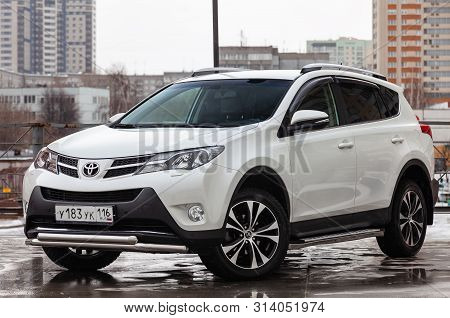 Novosibirsk, Russia - 07.25.2019: Front View Of Toyota Rav4 2015 Year In White Color After Cleaning 