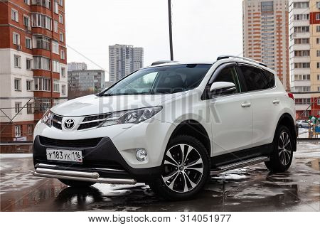 Novosibirsk, Russia - 07.25.2019: Front View Of Toyota Rav4 2015 Year In White Color After Cleaning 