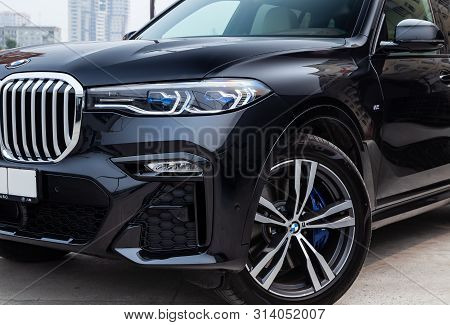 Novosibirsk, Russia - 07.20.2019: Black New Bmw X7 Xdrive40i 2019 Year Front Led Headlight, Turned W