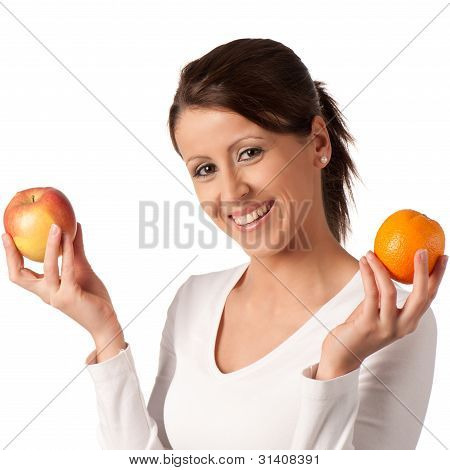 Attractive Young Woman With A Plate Of Different Fruits
