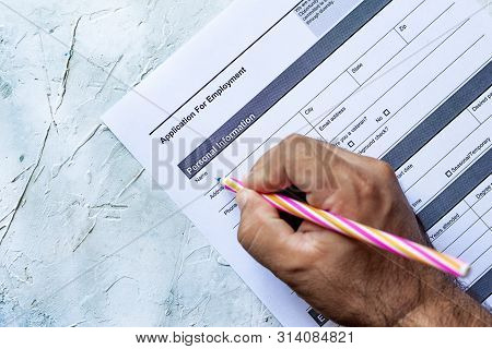 Hand Filling Standard Application For Employment. Hr, Hiring, Applicant Filling Job Application. Hr,