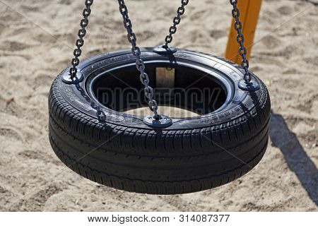 Umea, Sweden - July 22, 2019: Child Swing At Playground In Roback