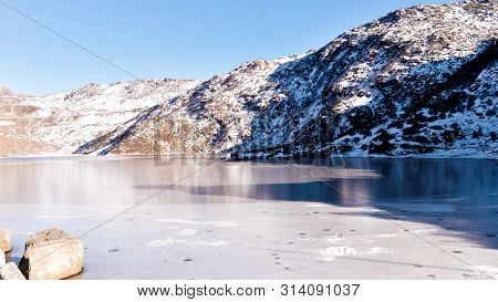 Tsomgo Lake (tsongmo Or Changu Lake) Frozen During Winter Season. It Is A Glacial Lake In East Gangt