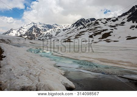 View From The Gavia Pass, An Alpine Pass Of The Southern Rhaetian Alps, Marking The Administrative B