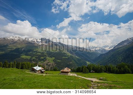 View From The Gavia Pass, An Alpine Pass Of The Southern Rhaetian Alps, Marking The Administrative B