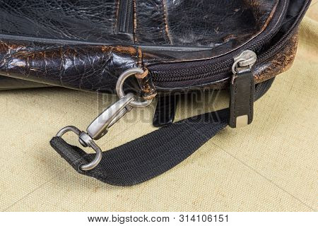 Fragment Of Old Black Handbag With Some Metal Bag Accessories