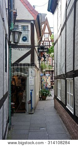 Bremen, Germany - 07 23 2015 - Scenic View Of Medieval Narrow Street In Schnoor, Half-timbered House