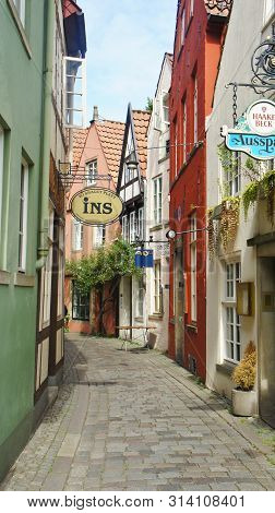 Bremen, Germany - 07 23 2015 - Scenic View Of Medieval Street Schnoor, Half-timbered Houses In The C