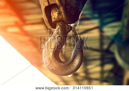 Electric Windlass With Hook For Lifting Large Loads. Against The Sky