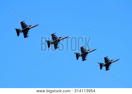 Four Jet Trainers In A Diagonal Movement Upshot