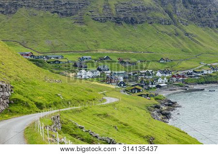 Bour Village. Typical Grass-roof Houses And Green Mountains. Vagar Island, Faroe Islands. Denmark. E