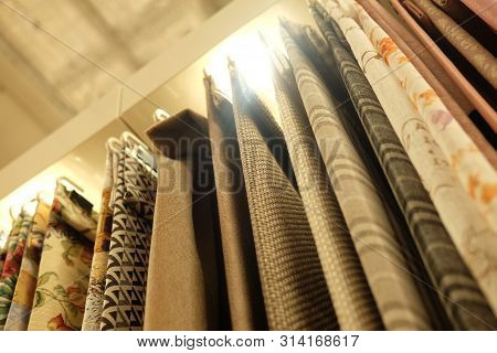 Sale - Colorful Fabrics In The Store, Close Up, Shopping Concept