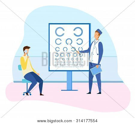 Male Ophthalmologist Checking Patient Eyesight. Oculist Stands By Sight Check Board For Vision Test 