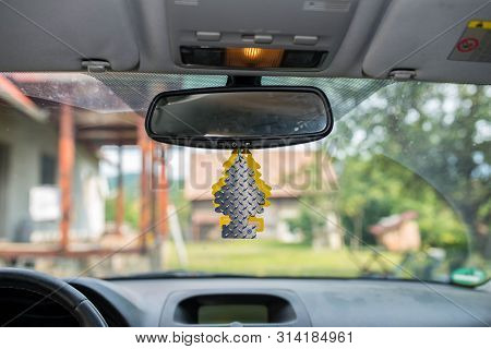Miercurea Ciuc, Romania- 29 July 2019: Hanging Pure Steel Wunder Baum Air Freshener On Car Interior.