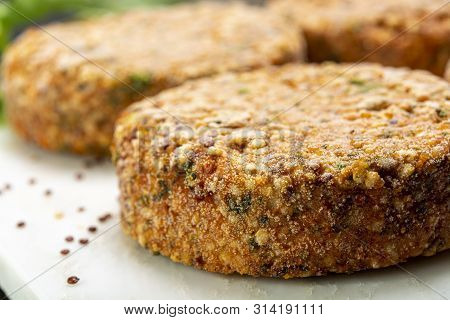 Tasty Vegetarian Burgers Made From Healthy Quinoa, Basil, Tomatoes And Mozzarella Cheese