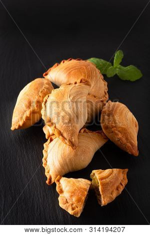 South East Asia Origin Food Concept Homemade Chicken Curry Puffs On Black Slate Stone Background Wit