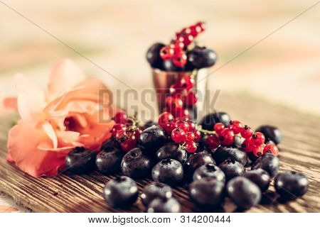 Beautiful Fragrant And Delicious Cyanococcus Berry On A Brown Background And A Beautiful Composition