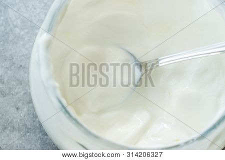 Homemade Goat Yogurt In Glass Bowl With Spoon / Probiotic Custard