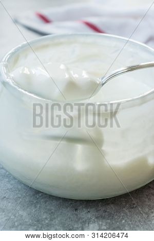 Homemade Goat Yogurt In Glass Bowl With Spoon / Probiotic Custard
