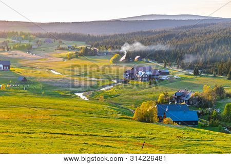 Jizerka Village At Sunset Time. View From Bukovec Mountain, Jizera Mountains, Czech Republic